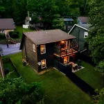The Copper Bird Mid Century Hot Tub Arcade Gameroom Rock Climbing Wall